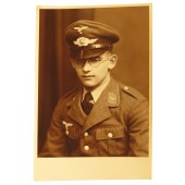 Photo portrait: Luftwaffe Flak-artillery soldier wearing Tuchrock and  LW visor cap